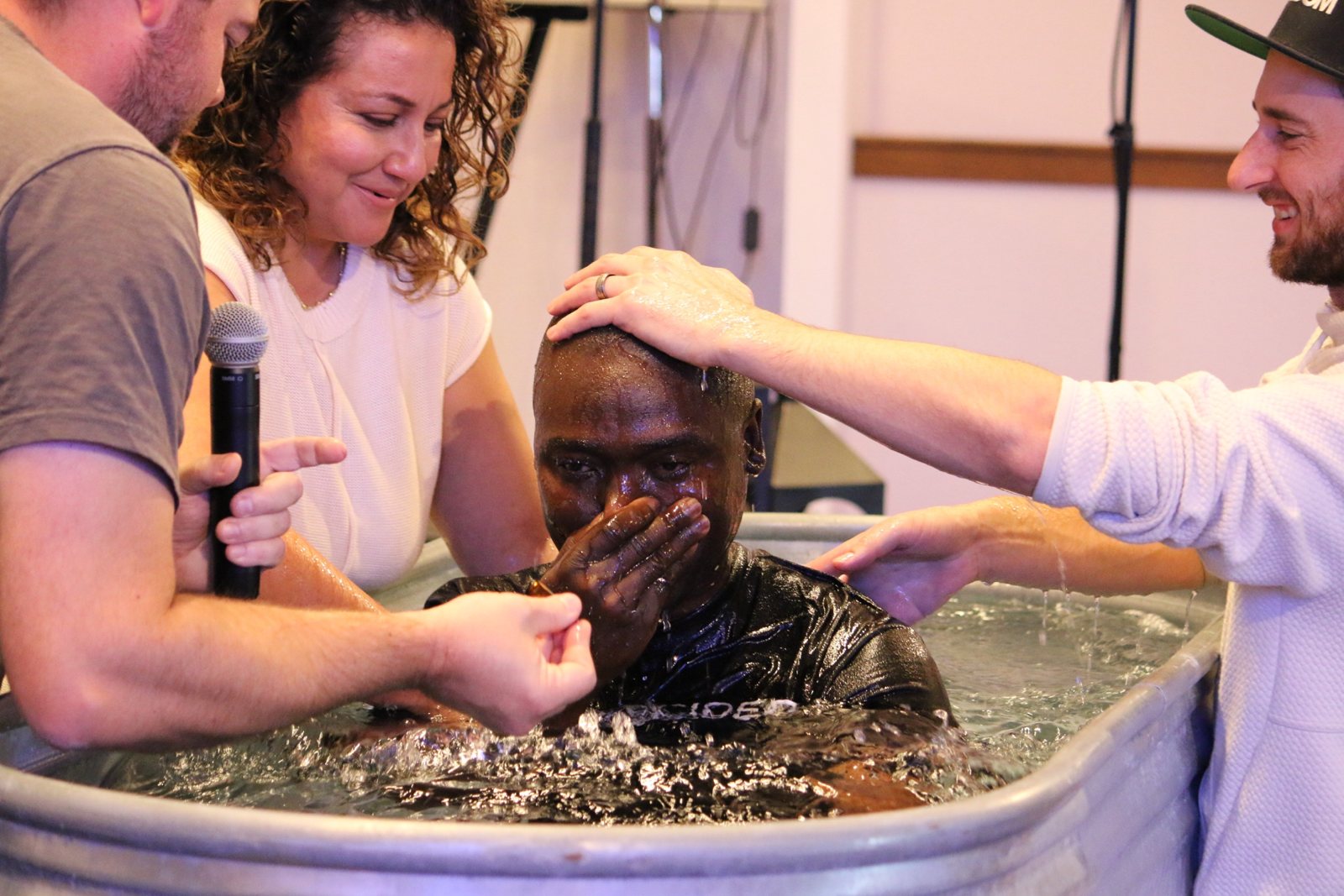 A joyful moment at a water baptism